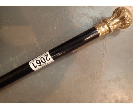 Victorian ebony walking stick with yellow metal top