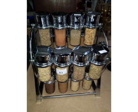 A SPICE RACK WITH CONTENTS