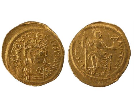 Byzantine Justin II AD 565-578 Solidus, helmeted and cuirassed bust facing, holding Victory on globe and a shield, rev VICTOR