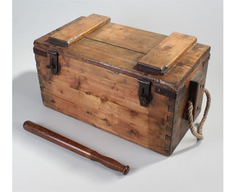 Pine ammunition box with steel fittings and rope carrying handles, to include a wooden baton; the box 53cm wide, 27.5cms high