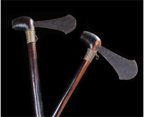 Pair of African throwing axes, with metal axe heads to the hardwood pole and copper twine, (2)