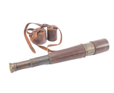 A leather cased four daw telescope by Dollond, London.



