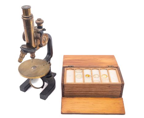 A German lacquered brass microscope, maker C Reichert, Wein,  rack and pinion focus with course/fine adjust, double objective