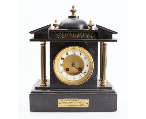 Richard et Cie, Paris a black slate mantel clock the eight-day duration mnovement striking the hours and half-hours on a gong
