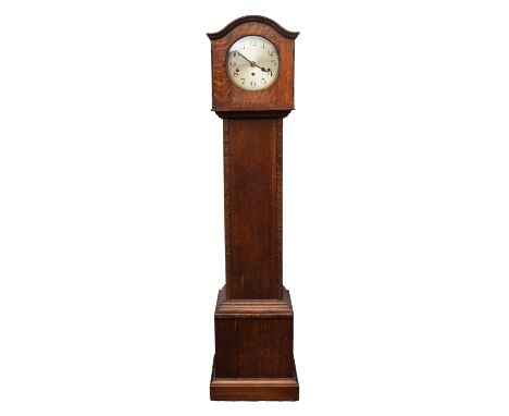 An oak miniature longcase clock the eight-day duration movement striking the hours and quarters on eight gong rods, the round