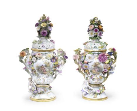 A pair of large Meissen flower-encrusted pot-pourri vases and covers, late 19th centuryAfter the model by J.J. Kaendler of 17