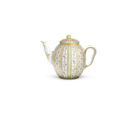 A small Sèvres hard-paste porcelain teapot and cover (théière Calabre), circa 1780Decorated with tooled vertical gilt bands e