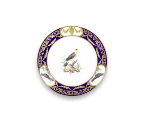A Sèvres blue-ground ornithological dessert plate from the 'Sudell Service' (assiette à dessert), dated 1792Painted by Charle