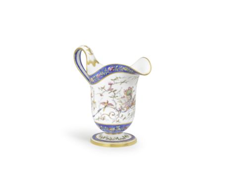 A Sèvres helmet-shaped milk jug (Pot à lait aiguière), dated 1788Decorated by Denis Levé with a trophy emblematic for love am