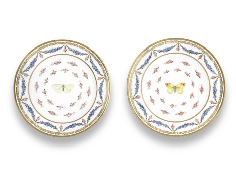 Two Sèvres hard-paste plates from the service fleurettes et papillons colorés, dated 1822Each with a central butterfly surrou