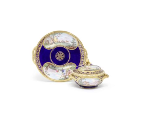 A Sèvres blue-ground écuelle, stand and cover (écuelle nouvelle forme et plateau), circa 1775Of the first size, painted by Ja
