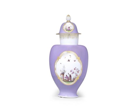 A Meissen lilac-ground Augustus Rex vase and cover, circa 1730Of ovoid form with a narrow, flared foot and cylindrical neck, 