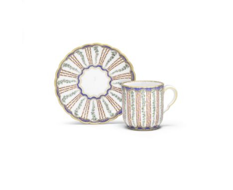 A Sèvres cup and saucer (gobelet 'cannelé' et soucoupe), dated 1764Of the first size, of fluted shape, painted by Antoine-Lou
