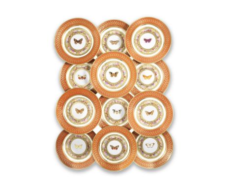 Twelve Sèvres plates from the 'Service de dessert Marly Rouge' for the Emperor Napoleon, circa 1809Each decorated in the cent