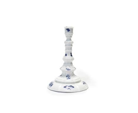 A Meissen candlestick, circa 1745-50The domed foot rising to a waisted base moulded with panels of bellflowers below a knoppe