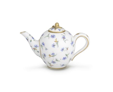 A very small Sèvres teapot and cover (théière 'Calabre'), dated 1781Painted by Mme Taillandier with scattered cornflowers, gi