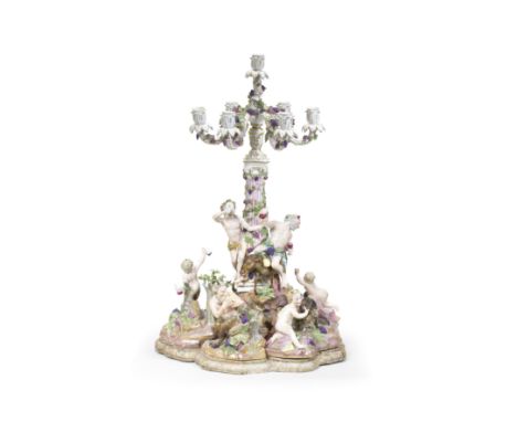 A large Meissen Bacchanalian table centrepiece, late 19th centuryAfter the models by J.J. Kaendler of 1761, comprising a cent