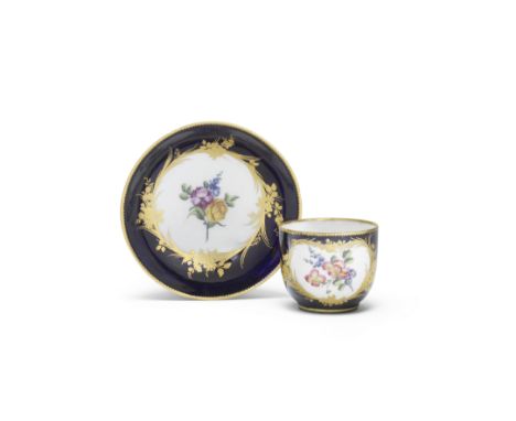 A Vincennes blue-ground cup and saucer (gobelet 'Bouillard' et soucoupe), dated 1754Of the first size, the dark bleu-lapis gr