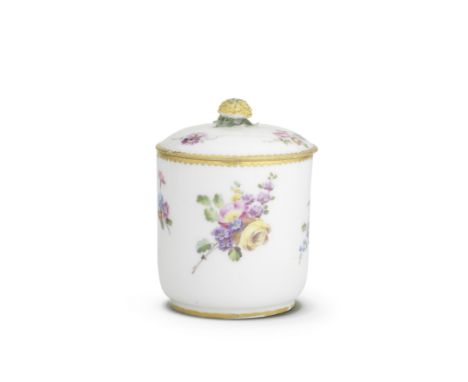 A Sèvres pomade pot and cover (pot à pommade), circa 1760-65Painted with scattered flower sprays, gilt dentil borders to the 