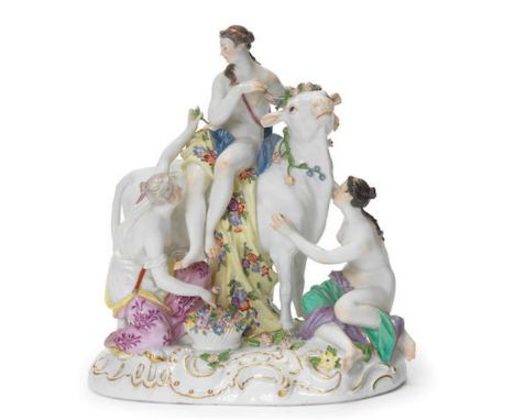A Meissen group of 'Europa and the Bull', circa 1770Modelled by J.J. Kaendler, the nude Europa draped in a yellow cloak embel