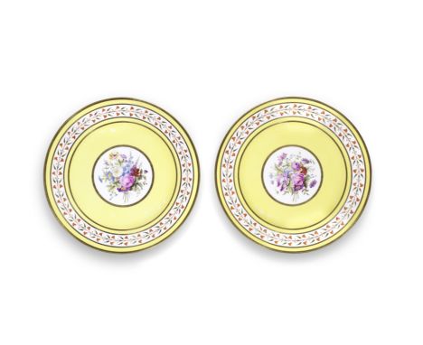 A PAIR OF SÈVRES YELLOW-GROUND PLATES FROM A SERVICE GIVEN BY NAPOLEON I TO THE COMTE DE SÉGUR, DATED 1812Each reserved with 