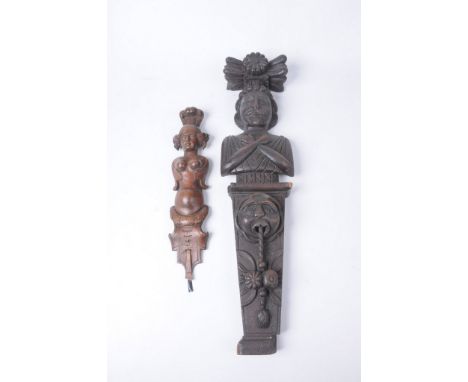Two Victorian and later carved oak pilasters or terminals
The first carved with a European male figure with arms crossed abov