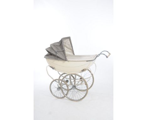 A Vintage Osnath Coach built baby pram
The pram of typical form, with original spoked wheels, the white painted frame with gr