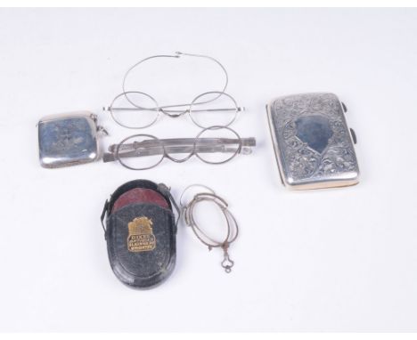 A Georgian pair of silver framed spectacles 
With oval lenses, one lens deficient, and extendable arms, bearing duty mark and