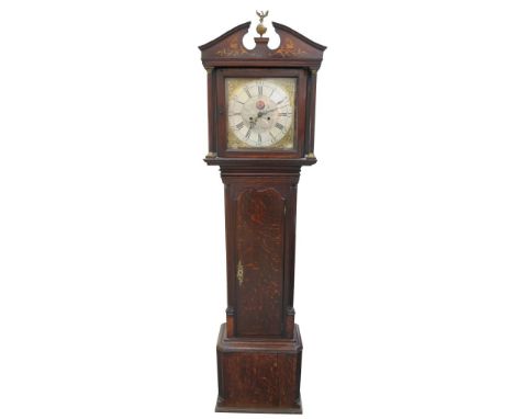 A 19th Century oak and mahogany eight-day longcase clock, Sam Collier, Eccles
The arched upper pediment with gilt metal spher