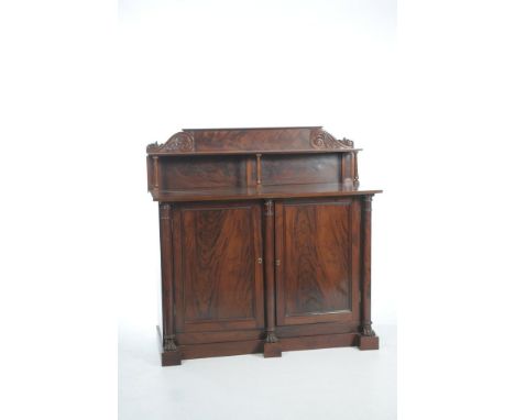 A Regency mahogany sideboard 
The raised back with a shelf supported by three ring turned tapering columns ,above a rectangul