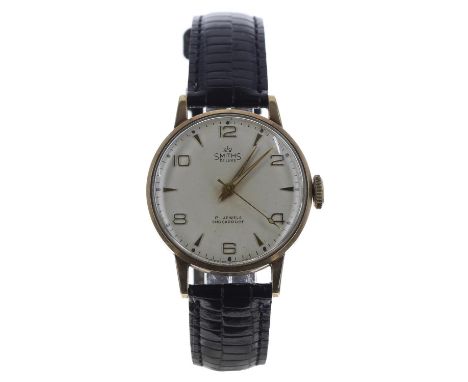 Smiths De Luxe 9ct gentleman's wristwatch, London 1962, circular silvered dial with applied gilt Arabic numerals and hour mar