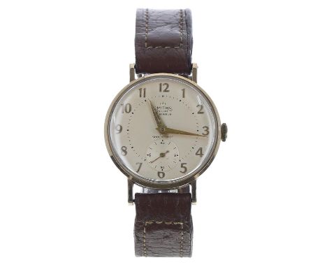Smiths De Luxe 9ct gentleman's wristwatch, London 1962, circular silvered dial with applied gilt Arabic numerals, inner minut