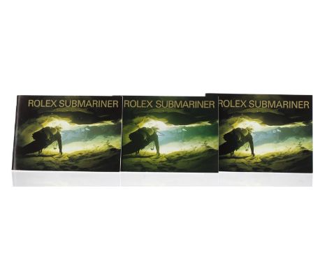 Rolex - Three Rolex Submariner booklets, circa 1999 and 2006-** Note the 1999 booklet is non English print