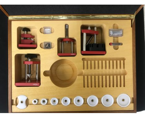 Horotec fitted wooden carry case containing a selection of Horotec watchmakers tools including MicroPress, MultiPress, HandsP