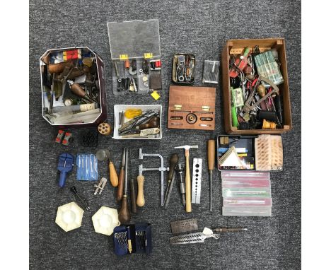 Large quantity of assorted watchmakers tools contained within a large carry case 