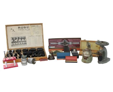 Star staking tool (lacking accessories); together with two wristwatch case opening tools; Robur crystal press with Robur wood
