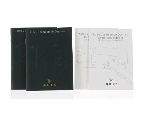 Rolex - Two Rolex Cosmograph Daytona booklets, circa 2003 and 2004; together with two Rolex Cosmograph Daytona Oysterlock Bra