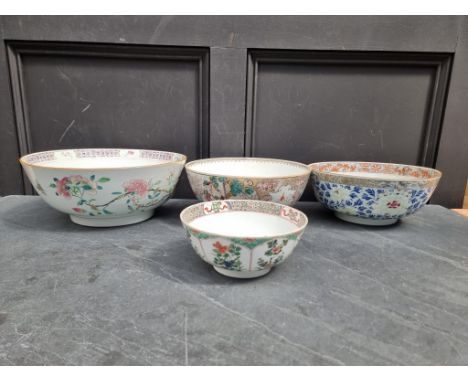 Three Chinese famille rose bowls,&nbsp;largest 34cm diameter; together with another Kangxi famille verte example, 19.5cm diam
