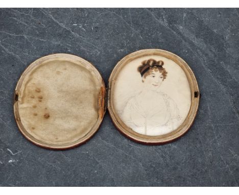 English School, early 19th century, bust length portrait miniature of a lady, pencil and watercolour, 10 x 8.5cm oval, in a r