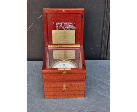 A Tiffany &amp; Co marine chronometer style desk clock,&nbsp;in mahogany and brass bound box, 18.5cm wide. 