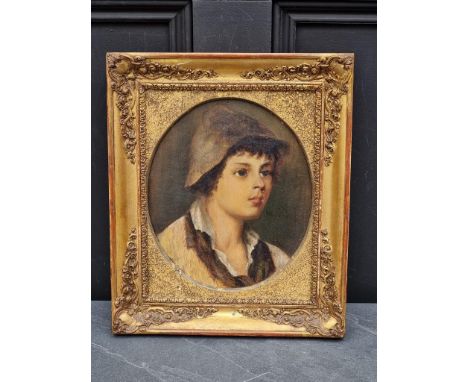 Manner of Alexei Alexeievich Harlamoff, head and shoulders portrait of a peasant boy, oil on board, 23.5 x 20cm oval. 