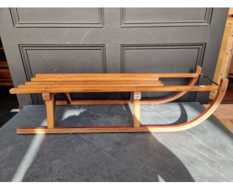 A beech and ply sled,&nbsp;99cm long. 