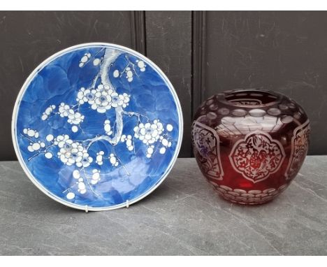 A Continental ruby flashed ovoid glass vase,&nbsp;with cut decoration, 19cm high; together with a blue and white prunus charg