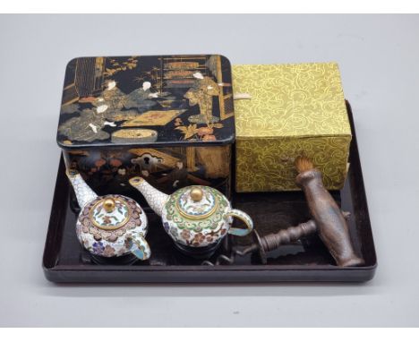 A small chinoiserie casket,&nbsp;13.5cm wide; together with two miniature Chinese cloisonne enamel teapots and covers; and a 
