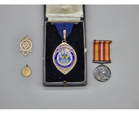 Medals: a Voluntary Medical Service Medal, to Miss Eileen A M Brake; together with a large silver and enamel 'Worthing Youth 