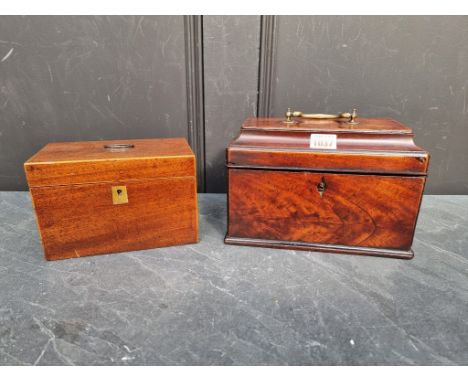A George III mahogany sarcophagus tea caddy, with concealed drawer, 24.5cm wide; together with another George III mahogany an