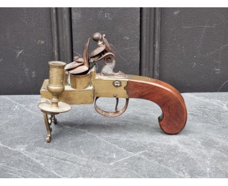 A 19th century flintlock tinder lighter.&nbsp; 