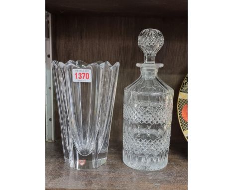 An Orrefors clear glass vase, 20cm high; together with an old cut glass decanter and stopper. (2) 