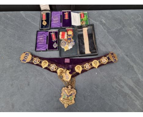 Medals: a collection of silver and other enamel mounted Royal Antediluvian Order of Buffaloes medals; and corresponding neck 