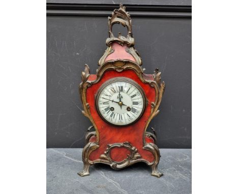 A Louis XV style tortoiseshell mantel clock, 39.5cm high, with pendulum. 